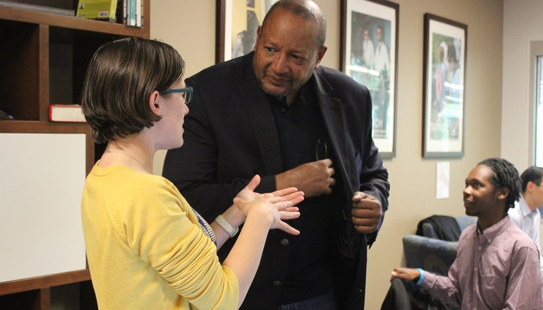 a man and a woman talking