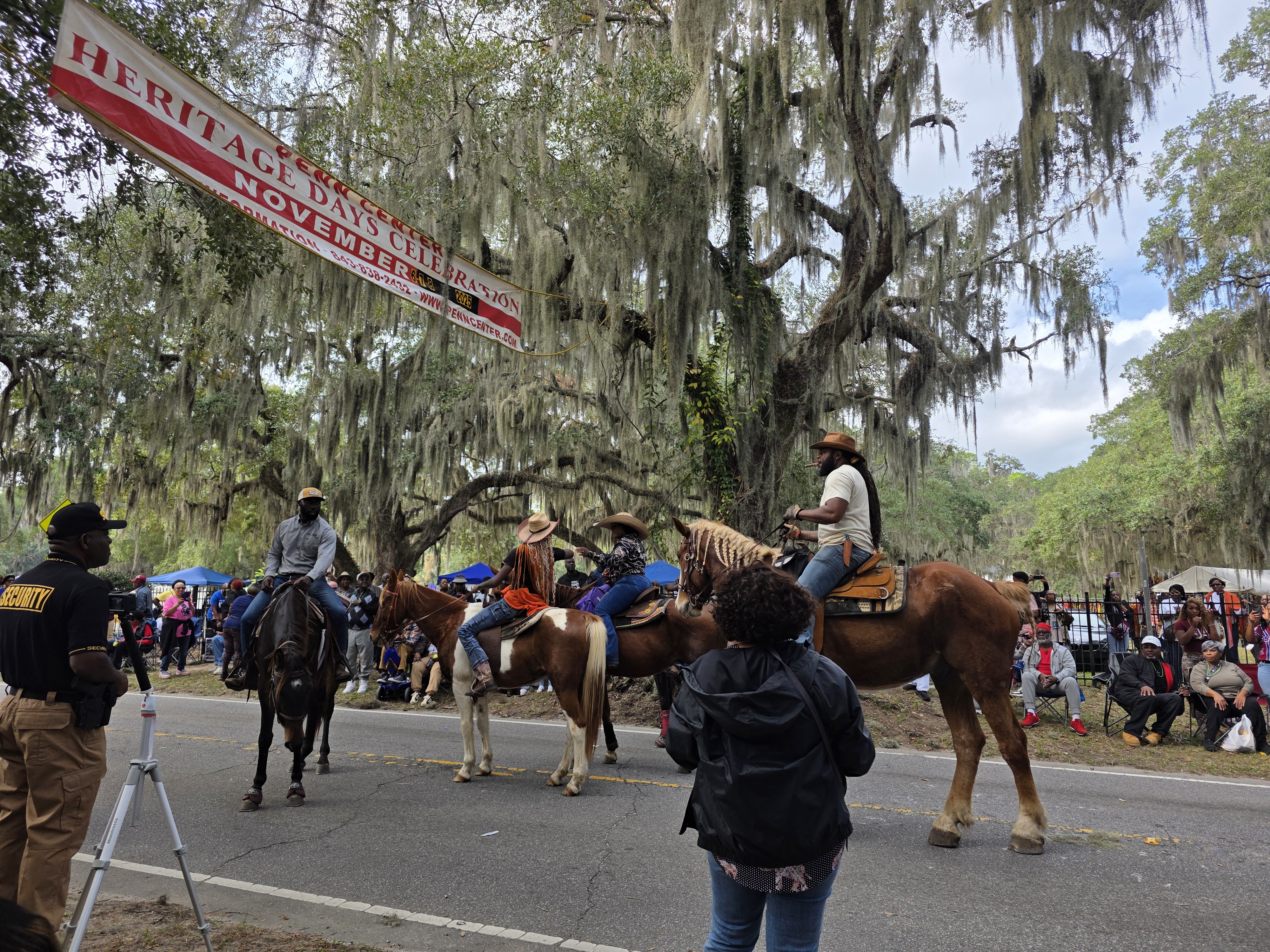 The Black cowboys walking through the parade